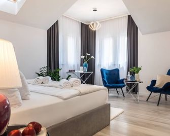Hotel Sofia - ורוצלב - חדר שינה