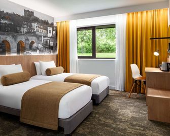 سوبر 8 باي ويندام دورهام - دورهام - غرفة نوم