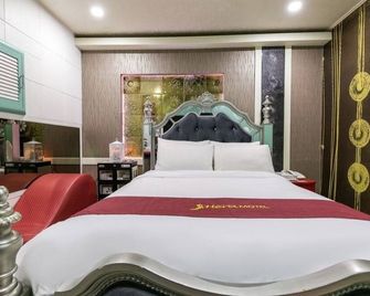 Hera Drive In Hotel - Ciudad de Jeju - Habitación