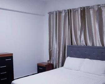 Lovely 1-bedroom rental unit for short stays. - Tema - Chambre