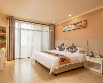 Ou K Yihao International Select House - Kanton - Slaapkamer