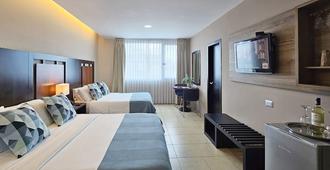 Hotel Perla Spondylus - Manta - Schlafzimmer