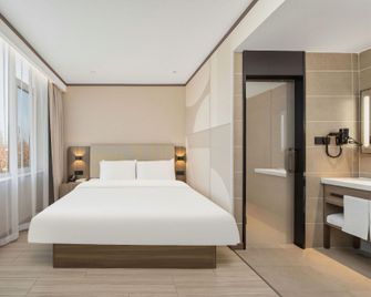 Hanting Hotel Zibo Hengtai Maqiao - Binzhou - Bedroom