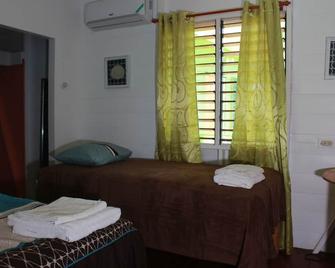 Cozy Cottages on the West End - Negril - Schlafzimmer