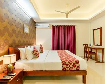 Hotel Hilite Inn - Ernakulam - Slaapkamer
