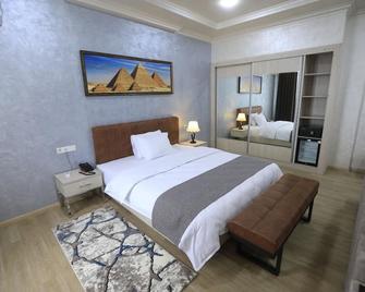 Chinor Hotel - Andizhan - Bedroom