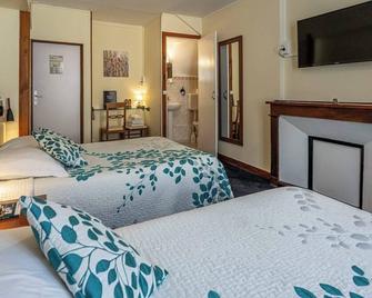 Logis Hôtel Central - Montargis - Slaapkamer