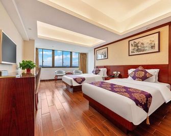 Ruyue Hotel - Lingshui - Slaapkamer