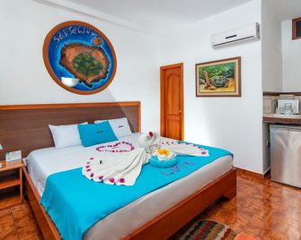 هوتل كولوما جالاباجوس - بورتو أيورا - غرفة نوم