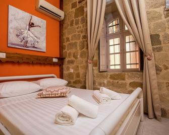Attiki Hotel - Charaki Ground Floor - Rodi - Camera da letto