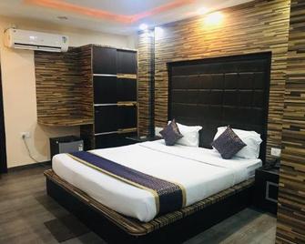 Hotel Ashoka Grand - Bhāgalpur - Bedroom