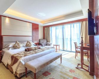 Huijin Holiday Hotel - Quanzhou - Спальня