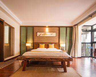 سيكريت كورتيارد ريزورت هوتيل - غويلين - غرفة نوم