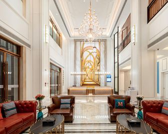 Vienna International Hotel Guangxi Yulin Traditional Chinese Medicine Port - Yulin - Lobby