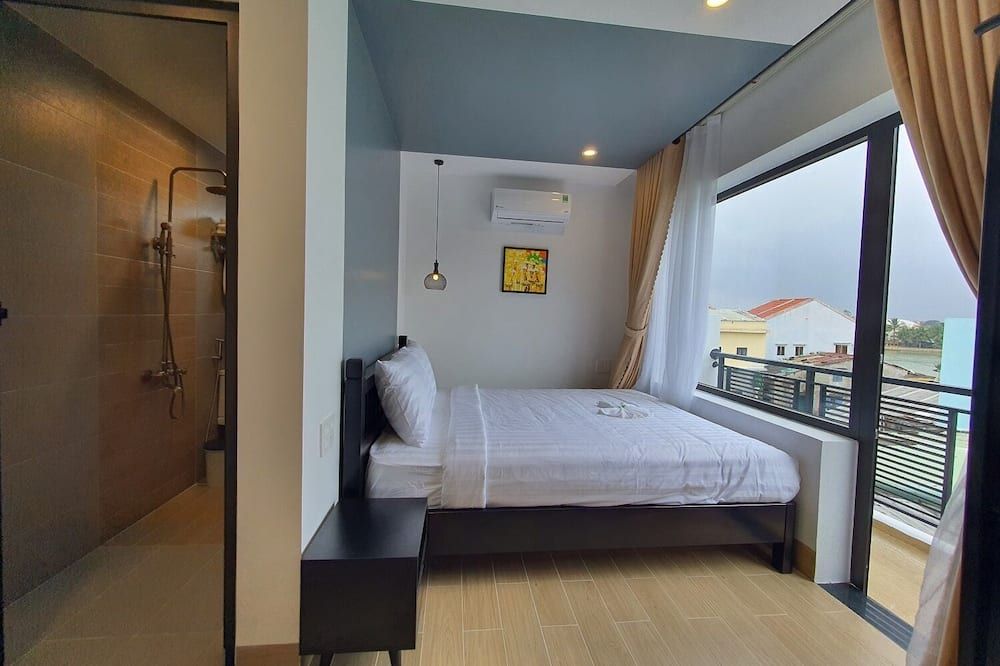 Maison Khoi Homestay - הוי אן - חדר שינה