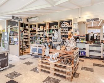 Waterlodges en Hotel Ark de Aalscholver - Lelystad - Winkel