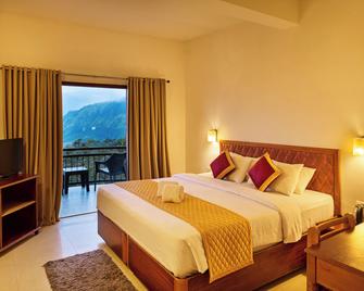 Deshadan Mountain Resort -The highest resort in Munnar - מונאר - חדר שינה