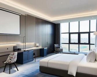 Meixi Hotel style Apartment (Luogang Central Park and Chang Center Branch) - Hefei - Chambre