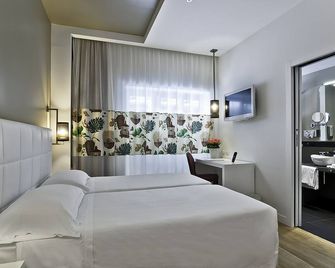 فندق كارافيل - روما - غرفة نوم