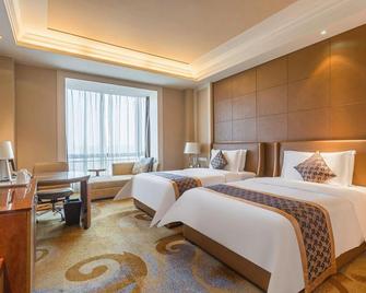 Juva Grand Hotel Hohhot - ฮูฮอต - ห้องนอน