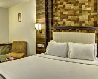 Hotel Aaram Orchard - Ahmedabad - Habitación