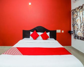 Hotel O Aljemin - Kanyakumari - Schlafzimmer