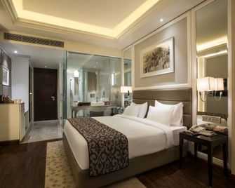 Singhania Sarovar Portico Raipur - Raipur - Habitación