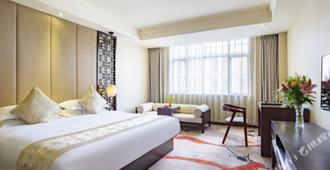 Dongfang Xuanyi Holiday Hotel - Baoshan - Bedroom
