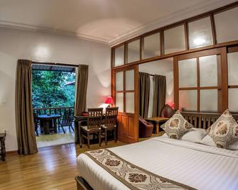 Hotel Akimomi - Pyin Oo Lwin - Slaapkamer