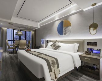 Kaman Intelligent Hotel (Changsha Riverside Financial Center Wanda Plaza) - Changsha - Soveværelse