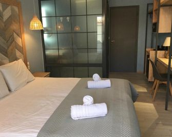 Hotel Sweet Home - نيوس مارماراس - غرفة نوم