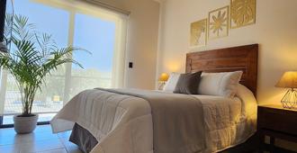 Suites Lomboy & Plaza - San José del Cabo - Habitación