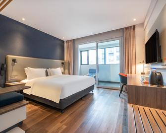 هوليداي إن إكسبرس جويانج جينيانغ أفينيو باي آيتش جي - قوييانغ - غرفة نوم
