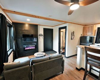 Wilderness Package at The Spot includes 2 Cabins! Located on Buskey Bay in Iron River, WI - Iron River - Living room