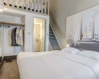 بي آند بي هوتل بولوني سور مير سان مارتين - سانت-مارتين-بولوجن - غرفة نوم