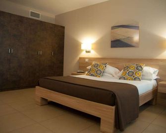 Hotel Dimorae Rooms and Suites - Apartments - Civitanova Marche - Habitación