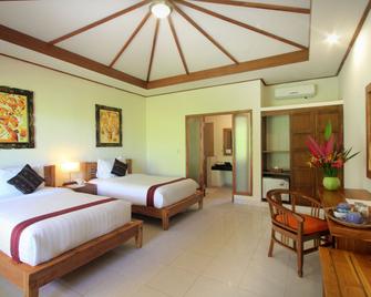 Puri Sari Beach Hotel - Labuan Bajo - Habitación
