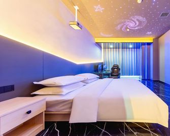 Future Esports Hotel (Huangzhou Student Street Branch) - Huanggang - Bedroom