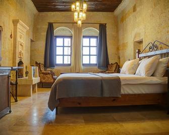 Karma Suites Cappadocia - Uchisar - Schlafzimmer