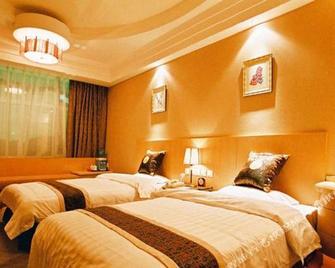 Oceanwide Hotel - Weifang - Schlafzimmer