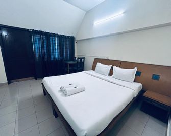 Hotel Iham Paradise - Mangalore - Sypialnia