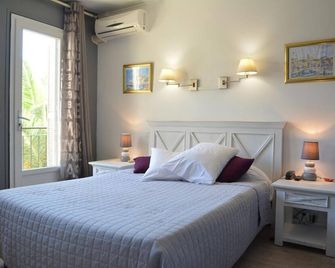 أوتل لو جريلو - ليل روس - غرفة نوم