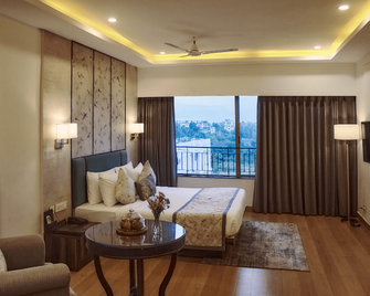 Voyage Milestone Hotel & Banquet - Siliguri - Bedroom