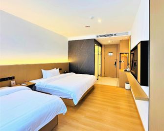Fengjin Holiday Hotel (Southwest Hospital Branch, Chongqing Shapingba High-speed Railway Station) - Chongqing - Habitación