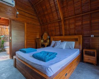 Kubu Selat Villa and Glamping - גיאניאר - חדר שינה