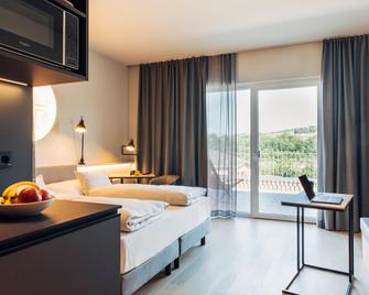 harry's home hotel & apartments - Steyr - Ložnice