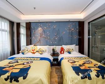 Rixin Hotel - Dongying - Schlafzimmer