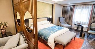 Xingtai Business Hotel - Quanzhou - Bedroom