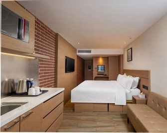 Zanzan Hotel - Yantai - Slaapkamer