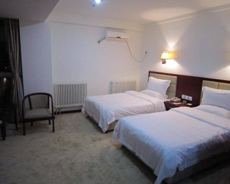 Jin Ding Hong Tai Hotel - בייג'ין - חדר שינה